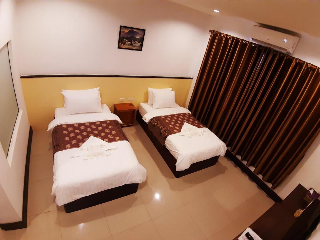 Dongsay Hotel Thakhek  Rooms  Standard Twin Room Bed 9
