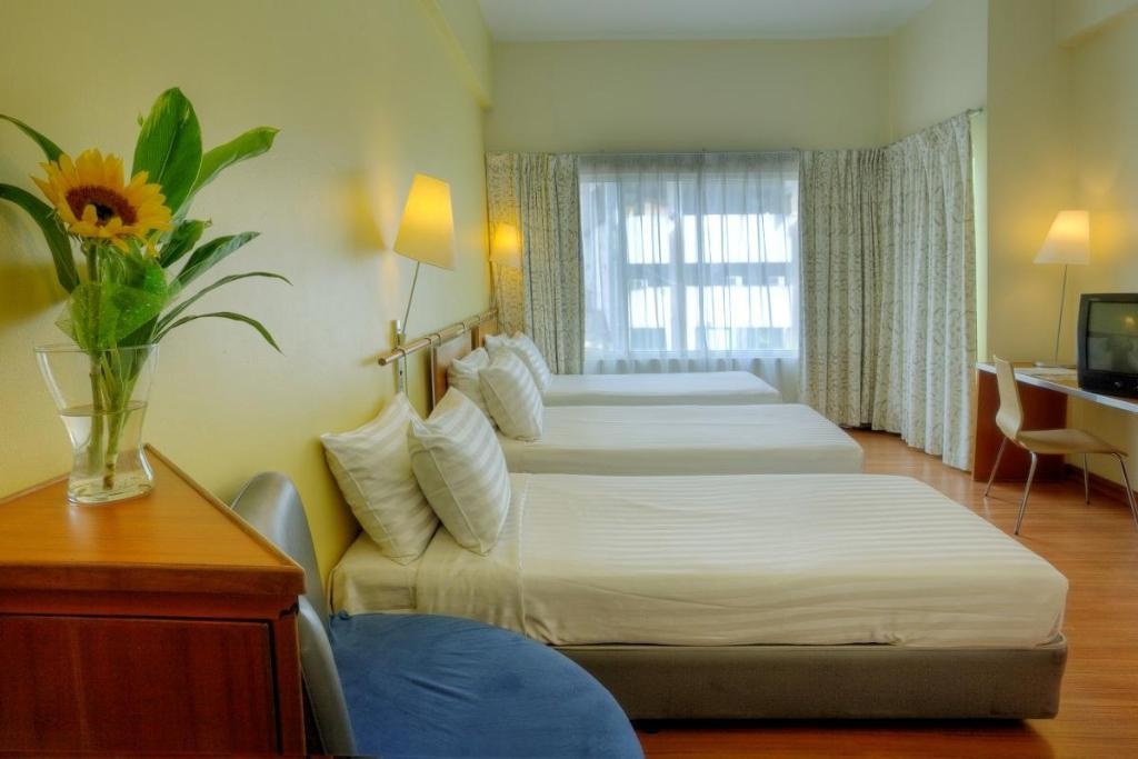 Alpha Genesis Hotel  Rooms  Deluxe Triple Bed 8